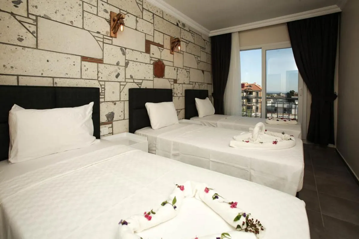 Bed in Lebedos Apart Hotel 1