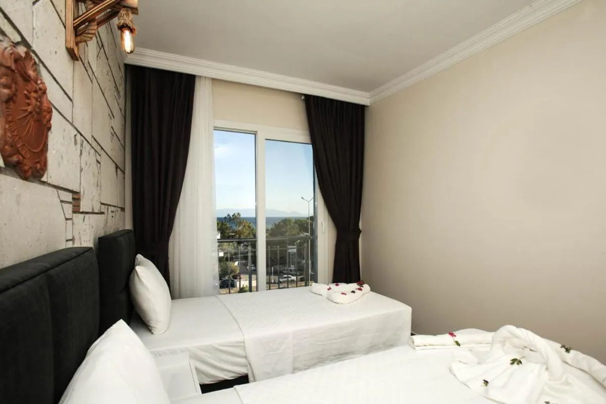 Bed in Lebedos Apart Hotel 1