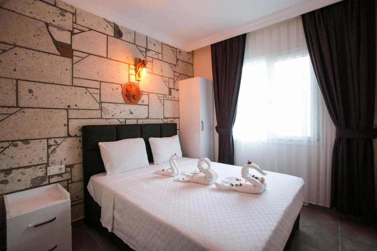 Bed in Lebedos Apart Hotel 1