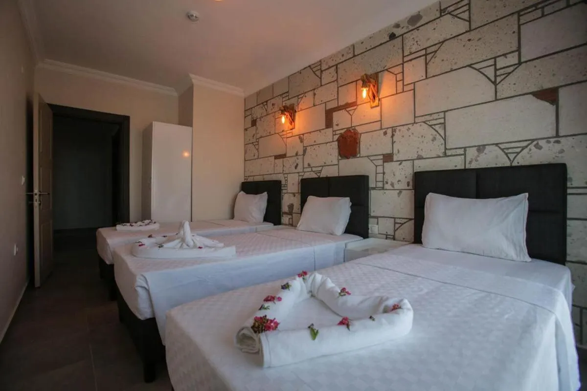 Bed in Lebedos Apart Hotel 1