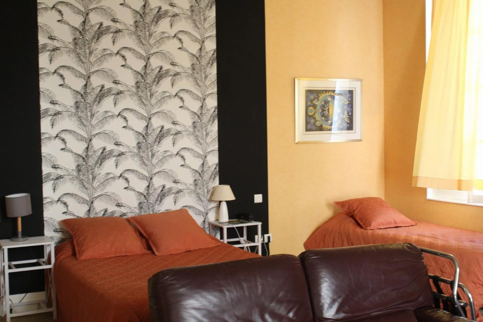 Property building, Seating Area in Hôtel de France