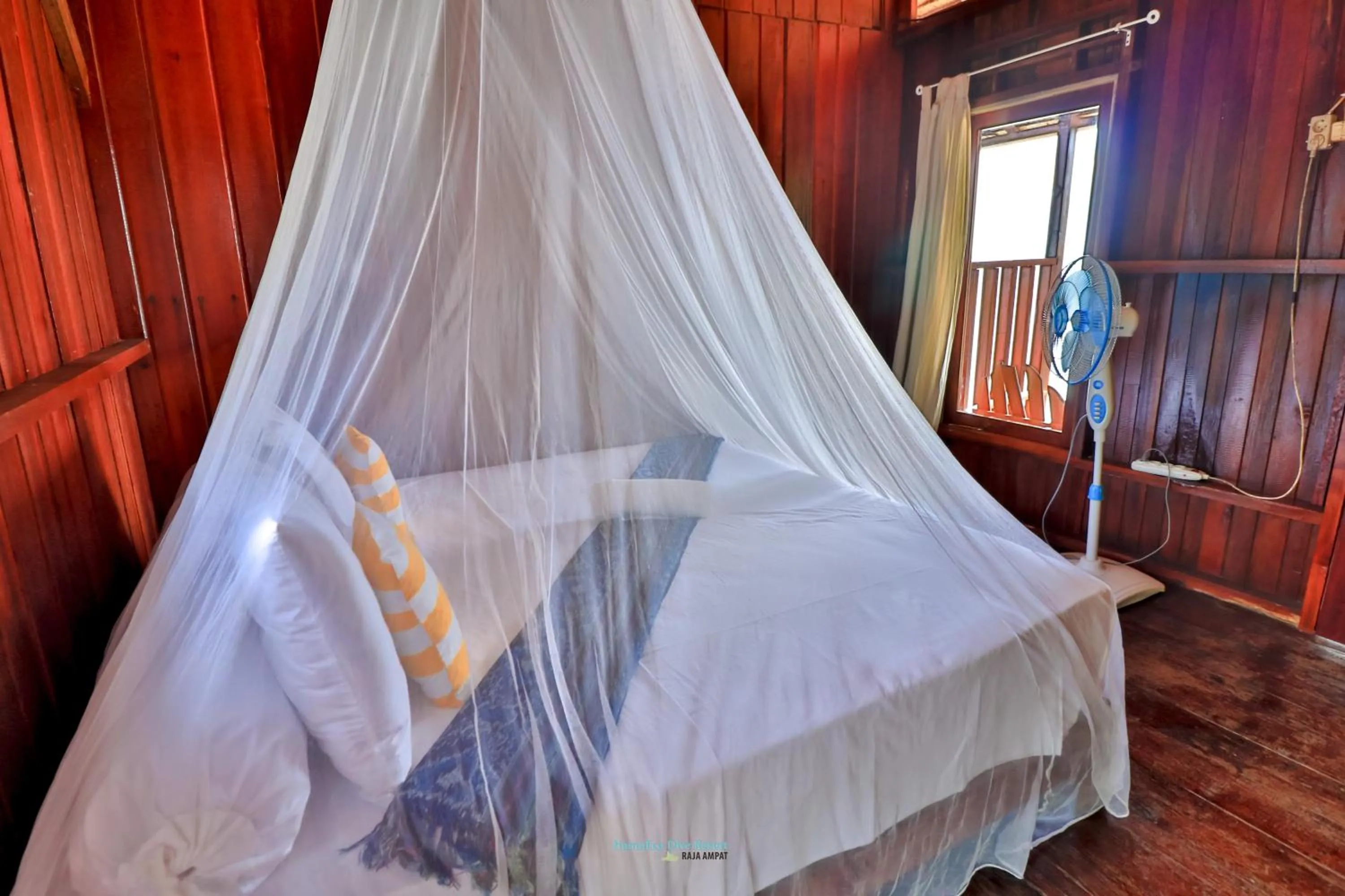 Bed in Hamueco Dive Resort Raja Ampat