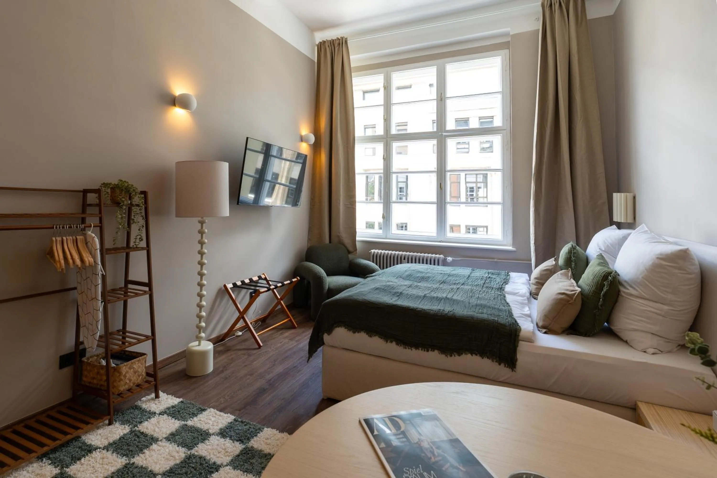 Photo of the whole room, Bed in The Charming by Curt Suites