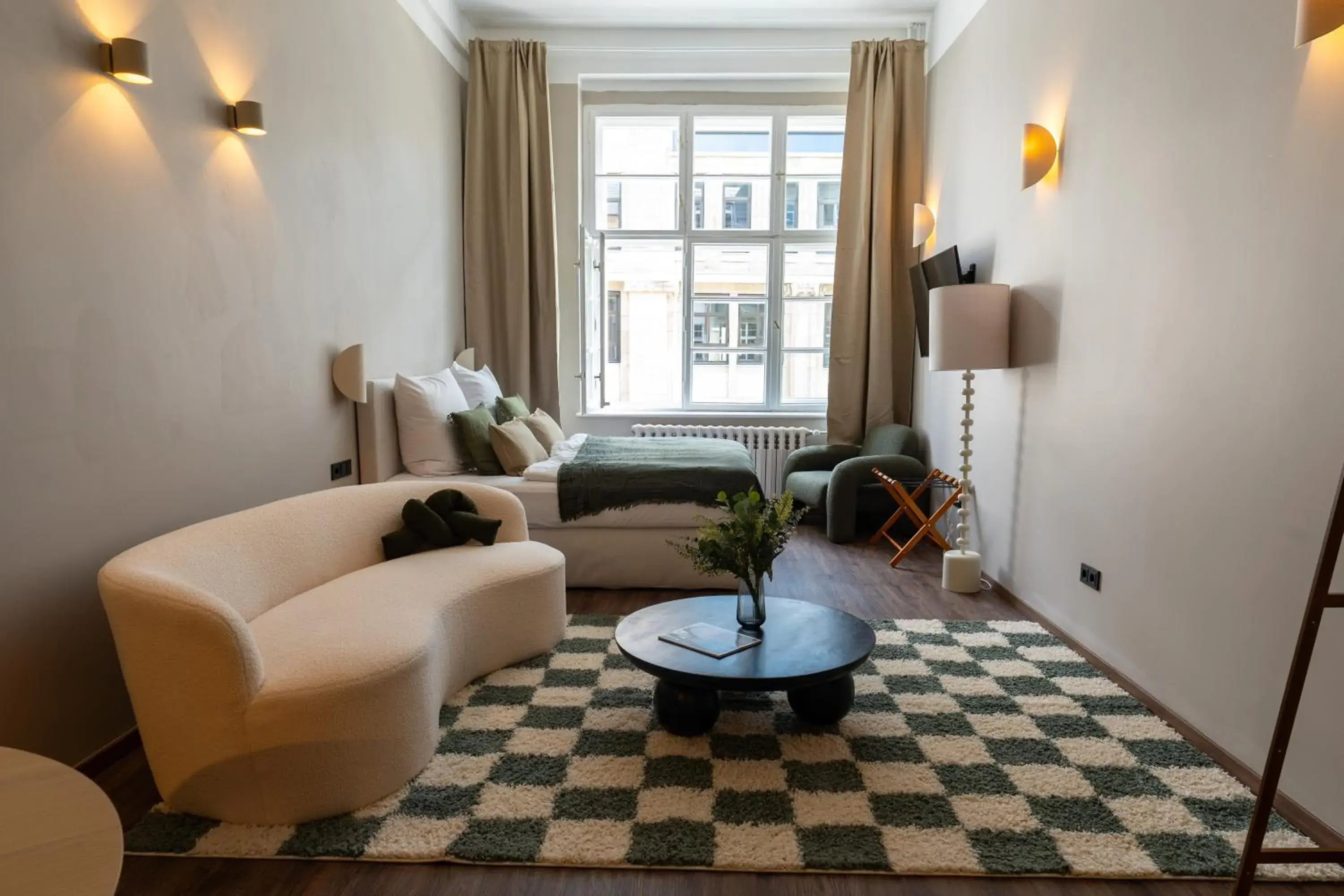 Photo of the whole room in The Charming by Curt Suites Photo of the whole room in The Charming by Curt Suites