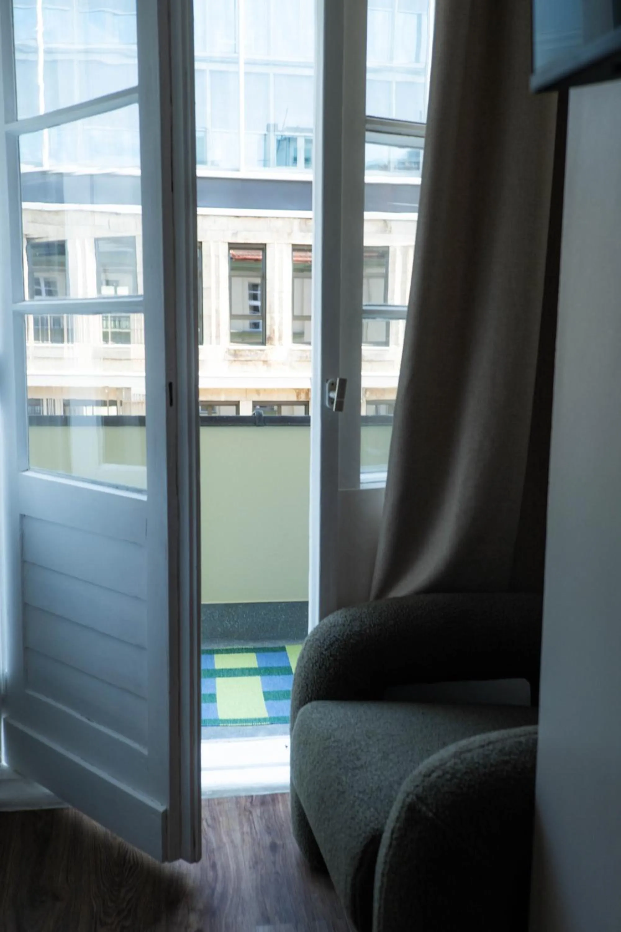 Photo of the whole room in The Charming by Curt Suites