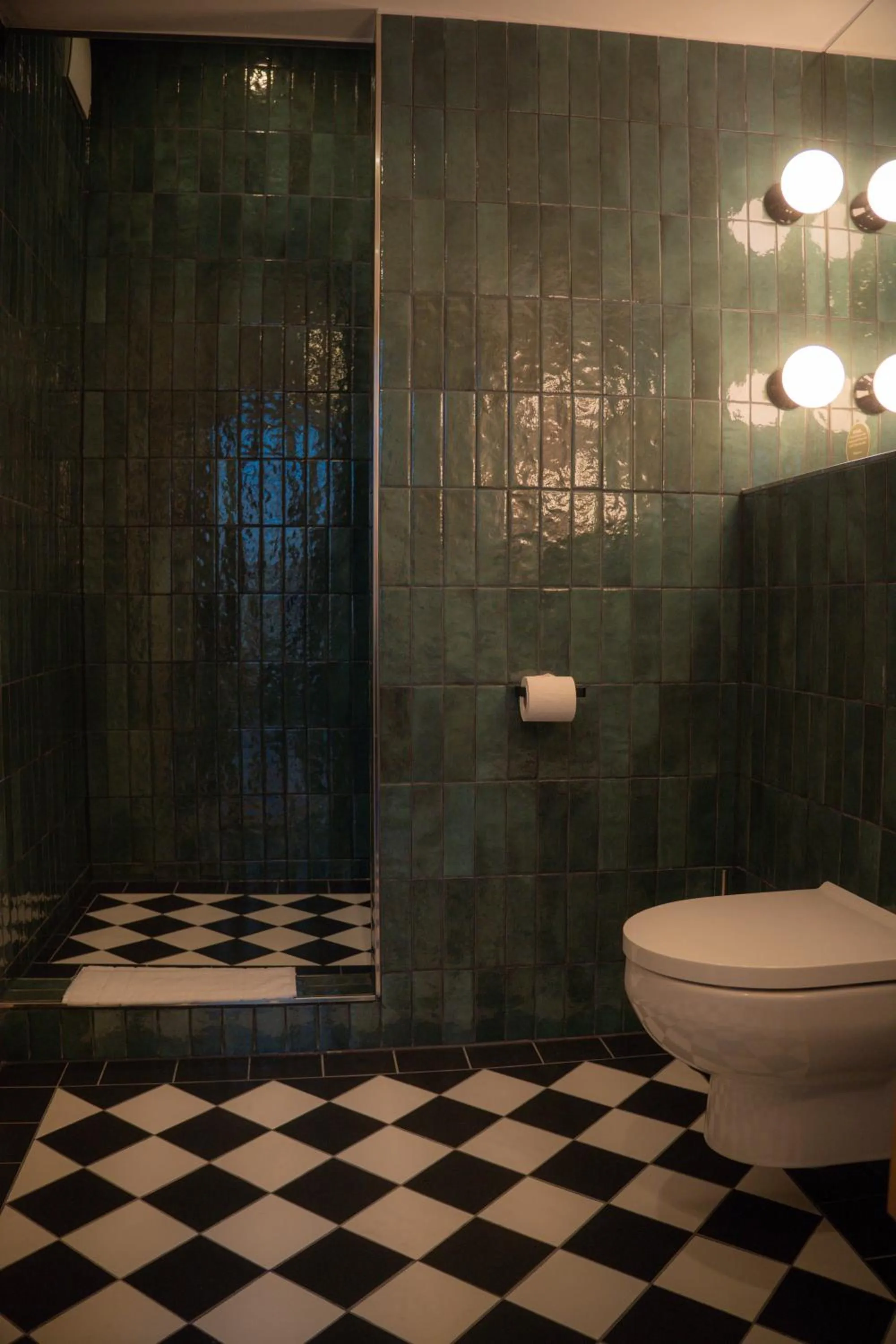 Bathroom in The Charming by Curt Suites