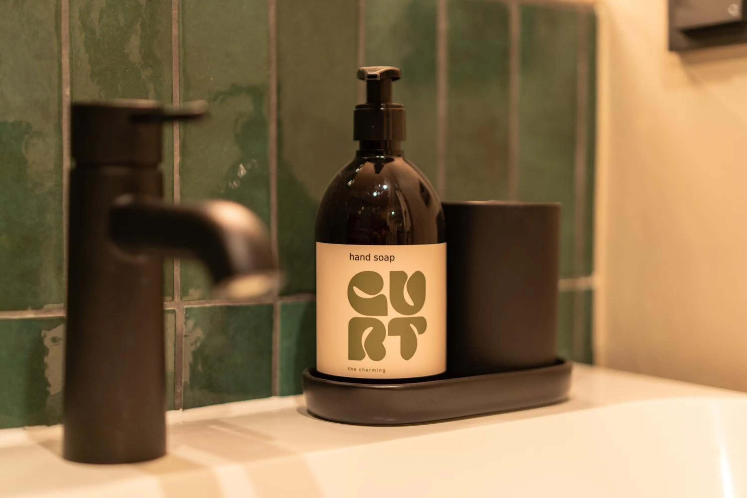 Bathroom in The Charming by Curt Suites