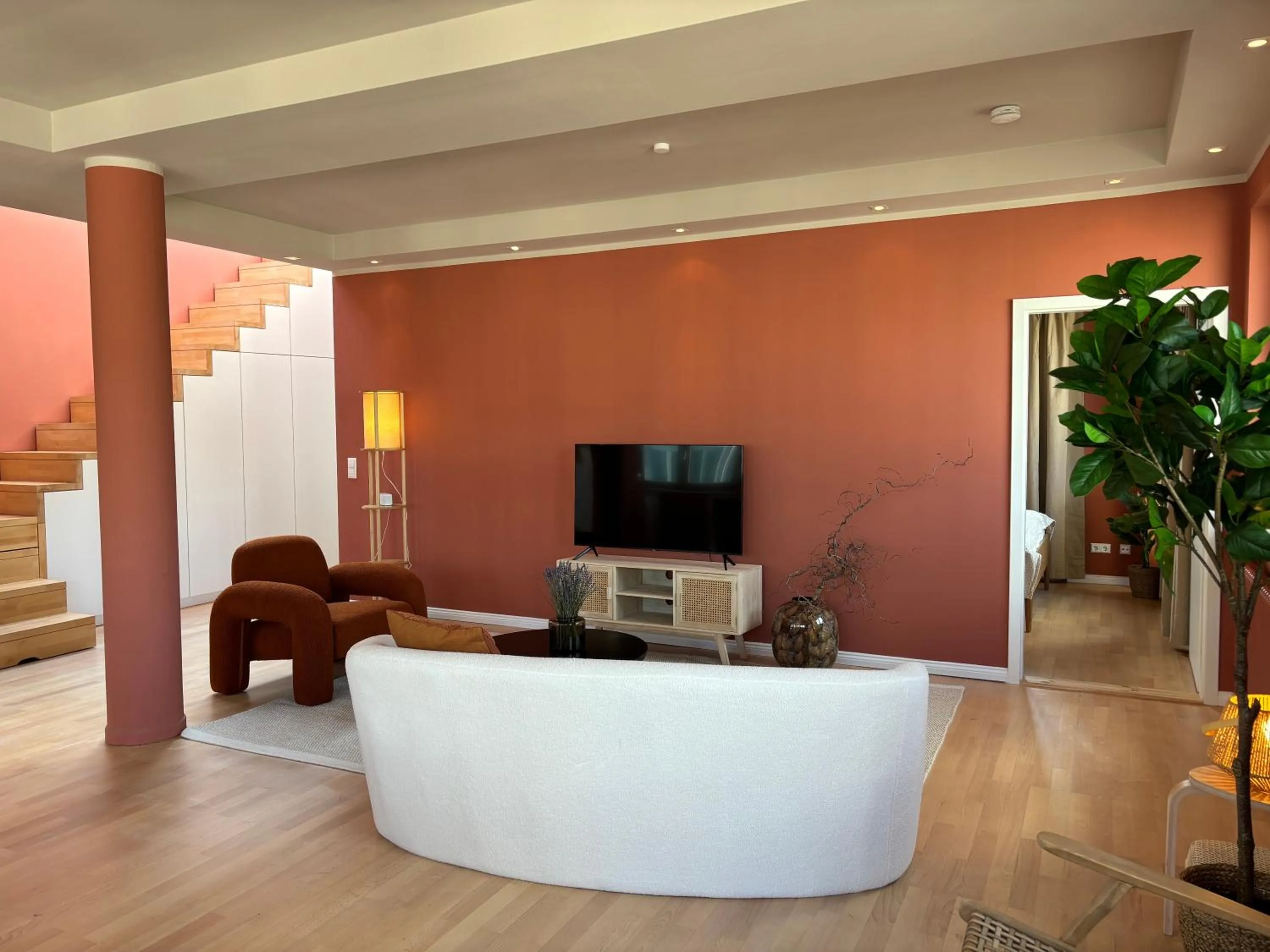 Communal lounge/ TV room in The Charming by Curt Suites