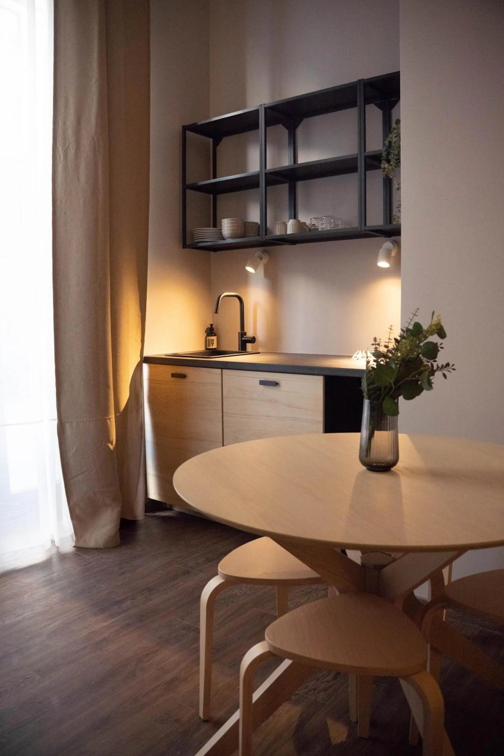 Photo of the whole room in The Charming by Curt Suites