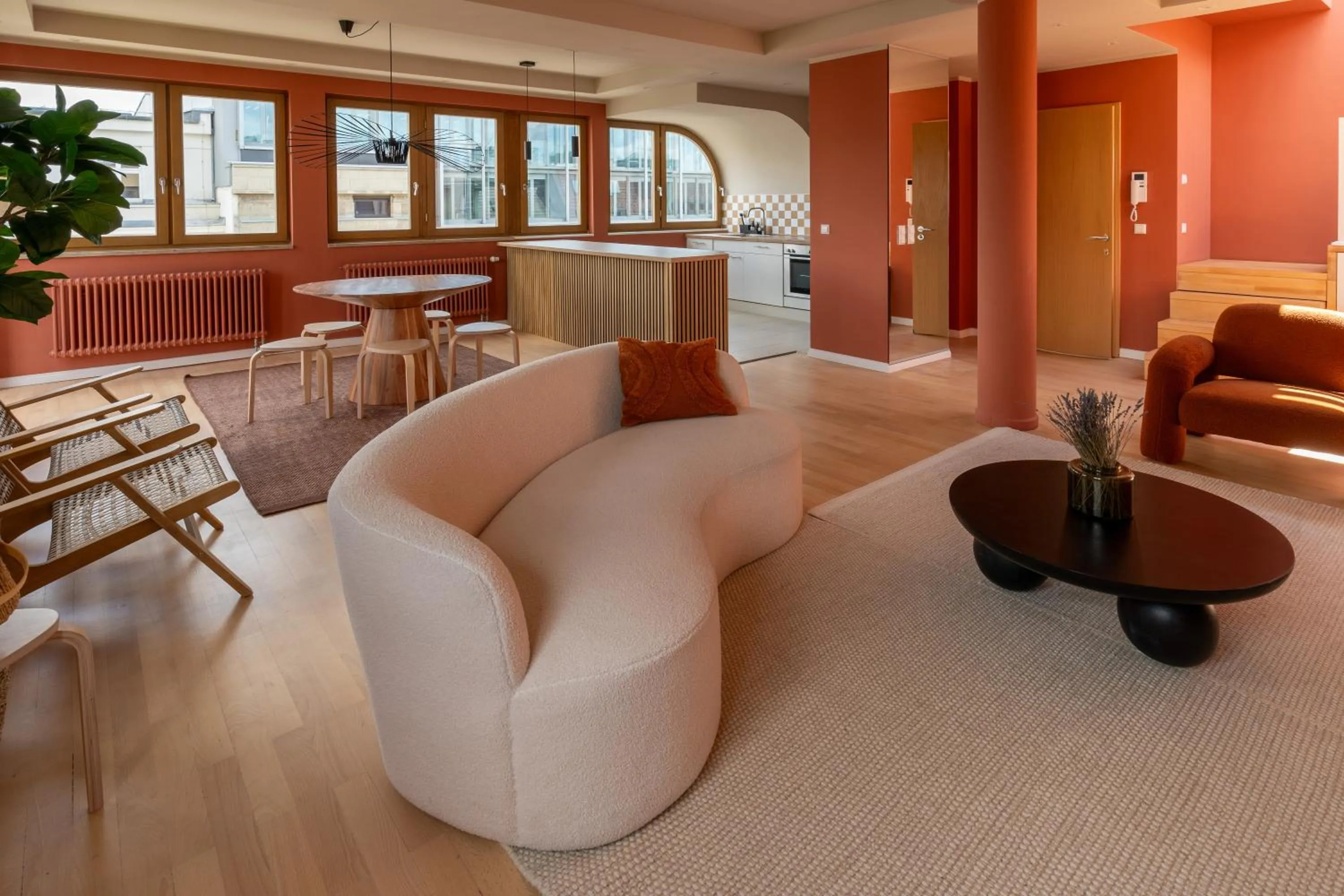 Living room in The Charming by Curt Suites