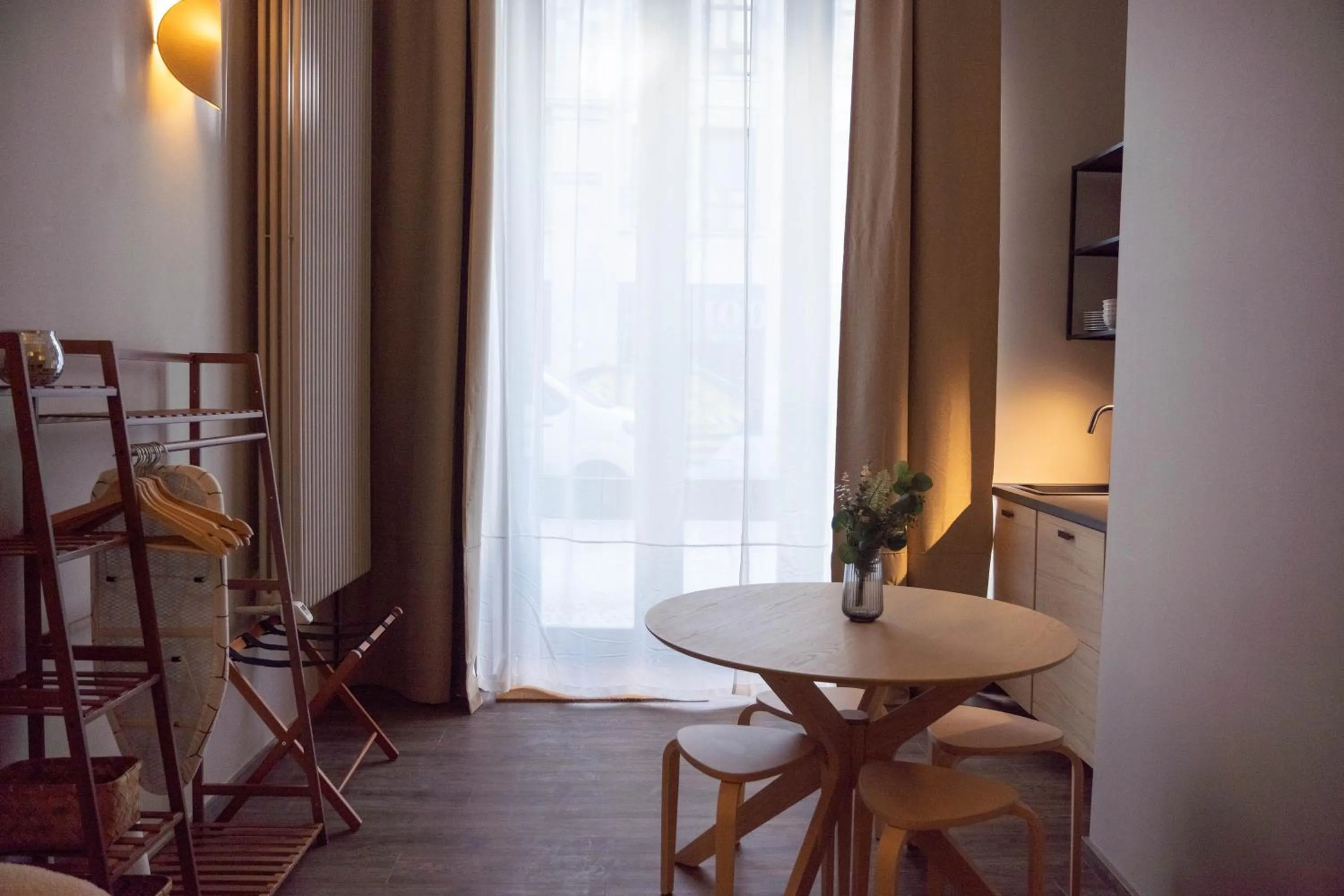 Photo of the whole room in The Charming by Curt Suites