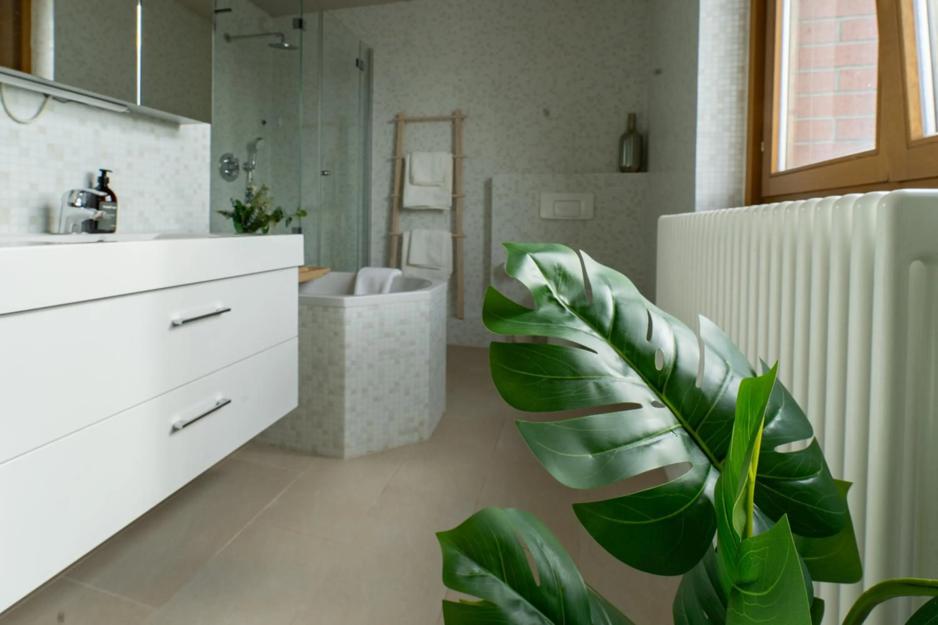 Bathroom in The Charming by Curt Suites