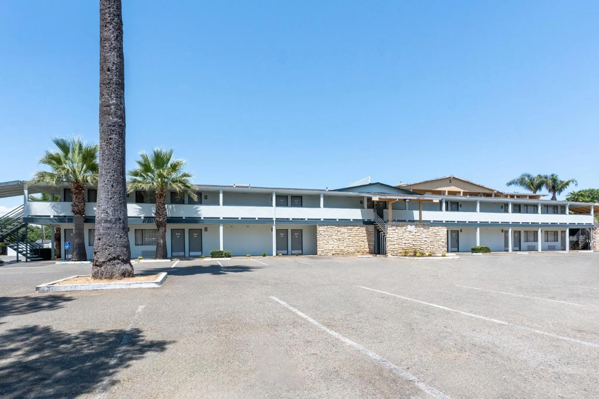 Property building in HomeTowne Studios by Red Roof Yuba City Bonanza - Marysville