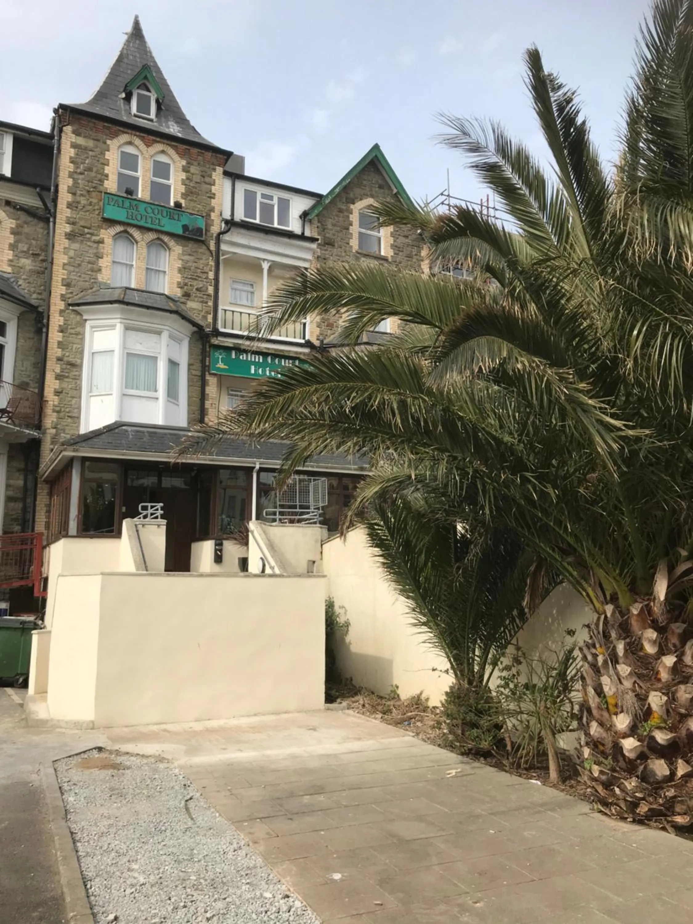 Property building in Palm Court B&B