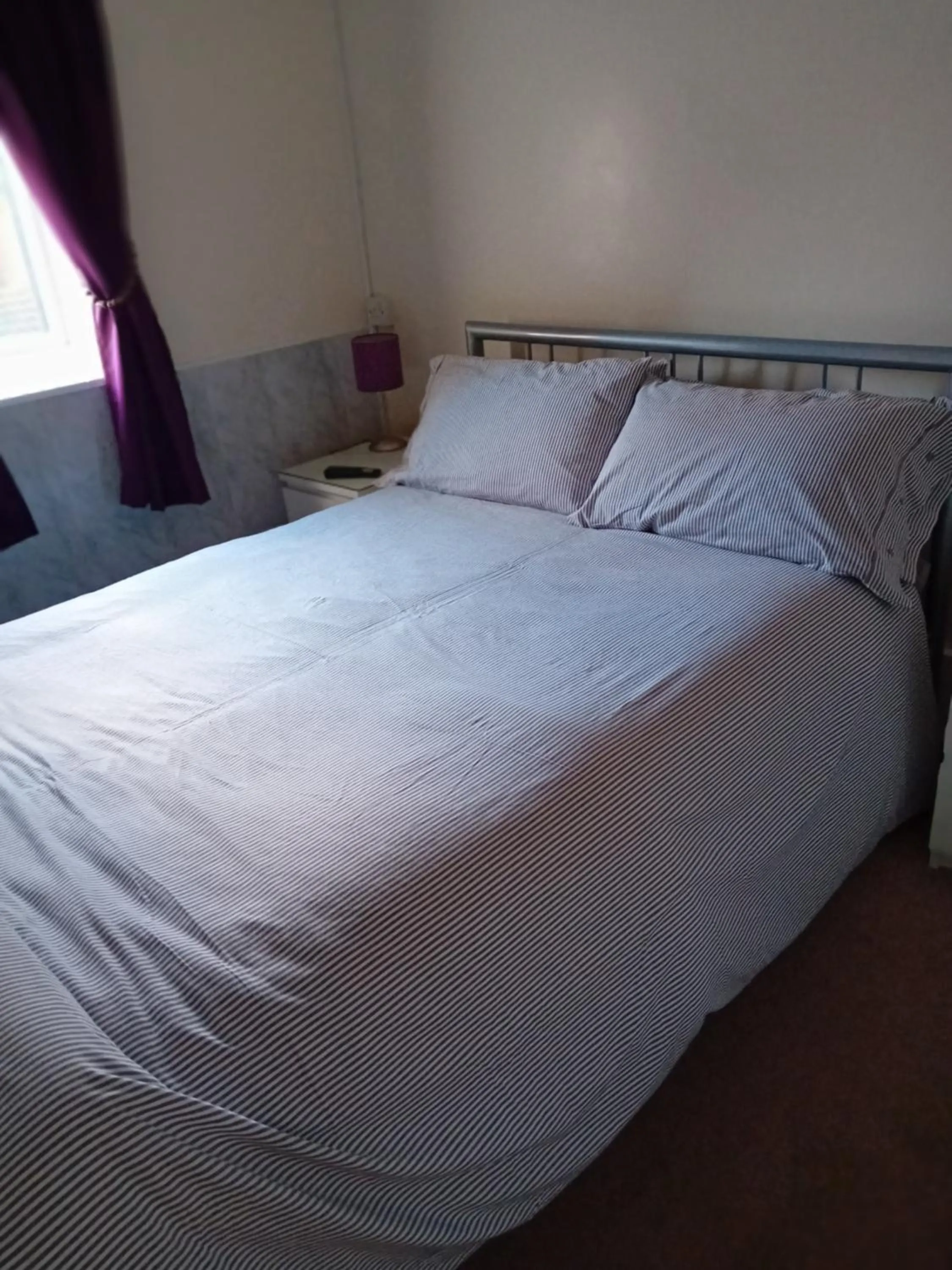 Photo of the whole room, Bed in Number twenty five
