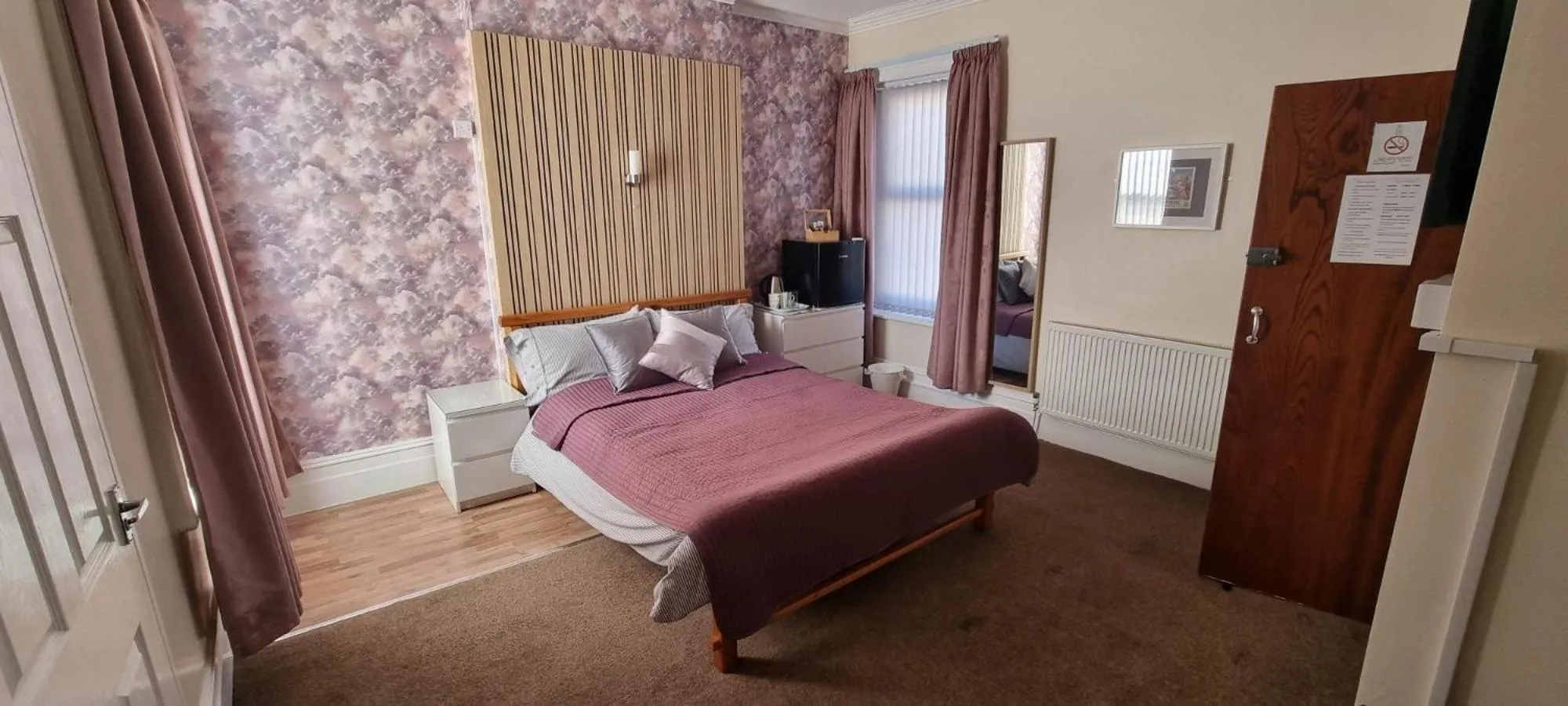 Photo of the whole room, Bed in Number twenty five