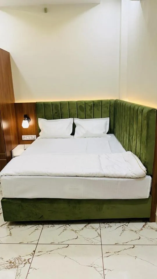 Bed in Hotel Ratnam Palace Maheshwar