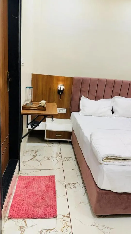 Bed in Hotel Ratnam Palace Maheshwar