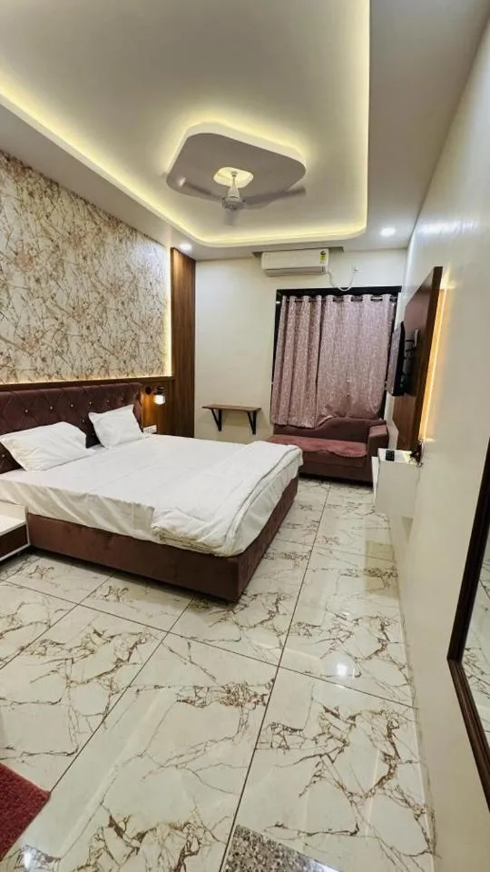 Bed in Hotel Ratnam Palace Maheshwar