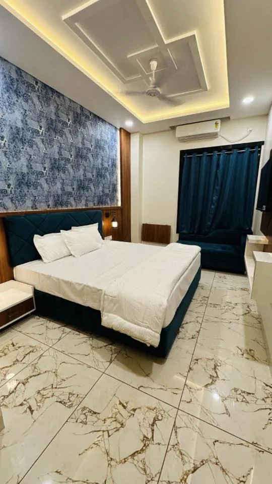 Bed in Hotel Ratnam Palace Maheshwar