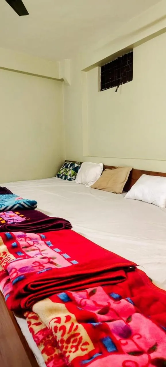 Bed in Hotel Ratnam Palace Maheshwar