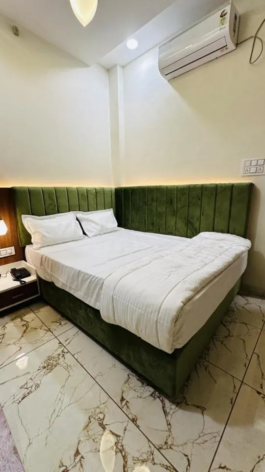 Bed in Hotel Ratnam Palace Maheshwar