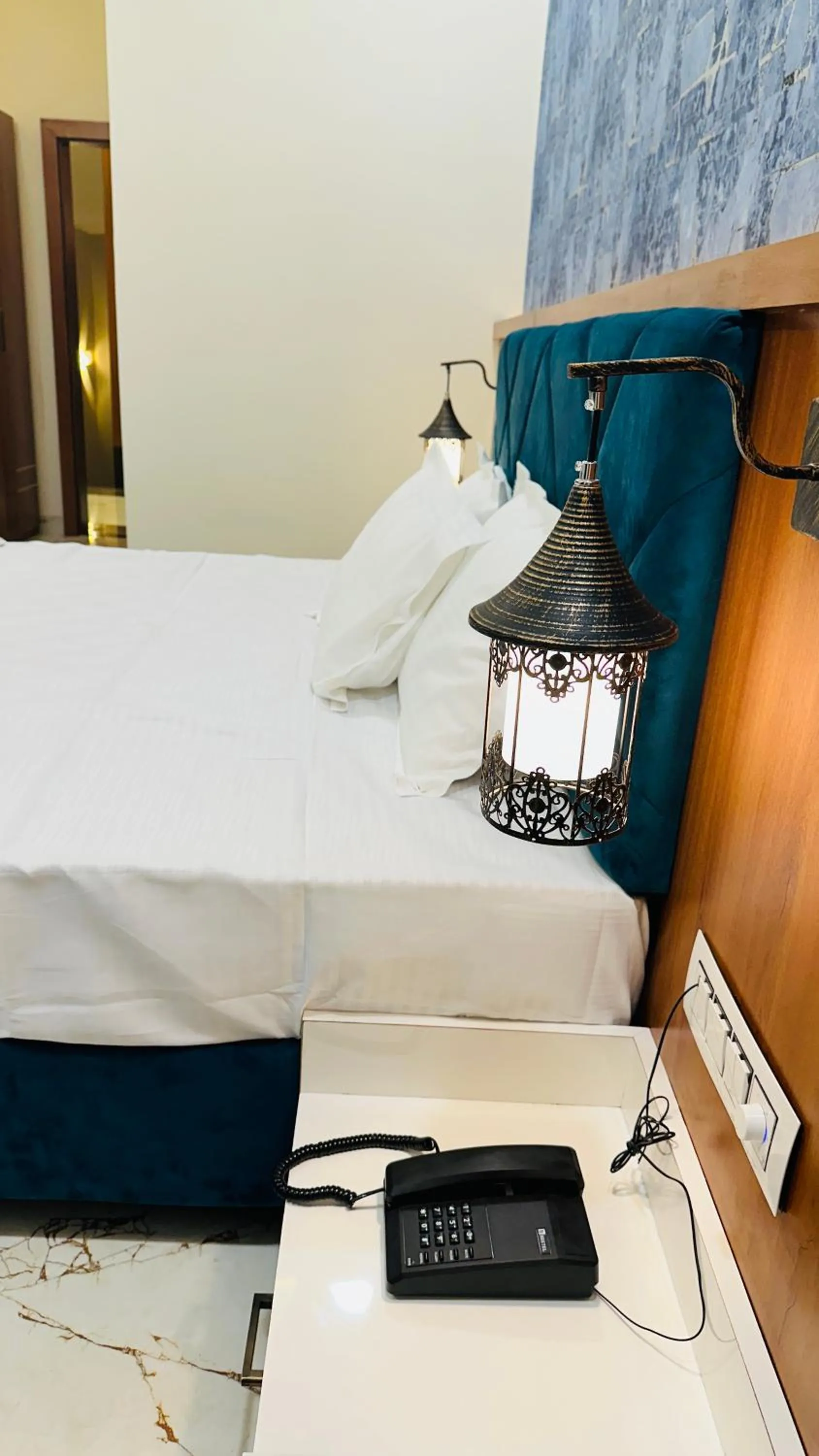 Bed in Hotel Ratnam Palace Maheshwar