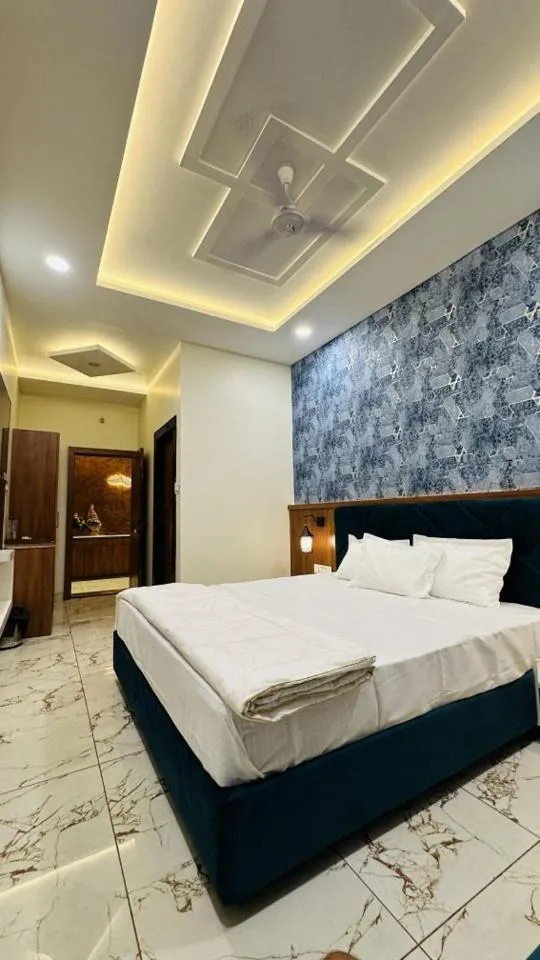 Bed in Hotel Ratnam Palace Maheshwar