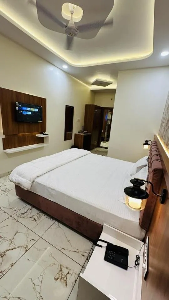 Bed in Hotel Ratnam Palace Maheshwar