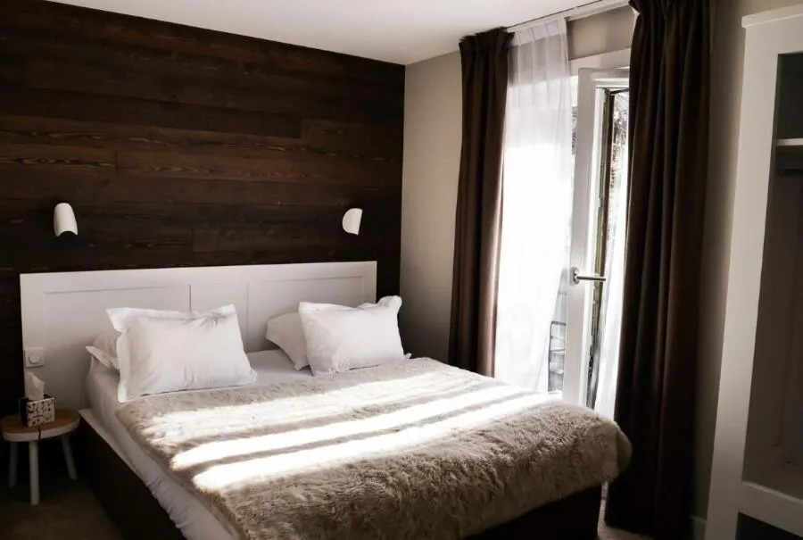 Bedroom in Chalet hôtel le Whymper