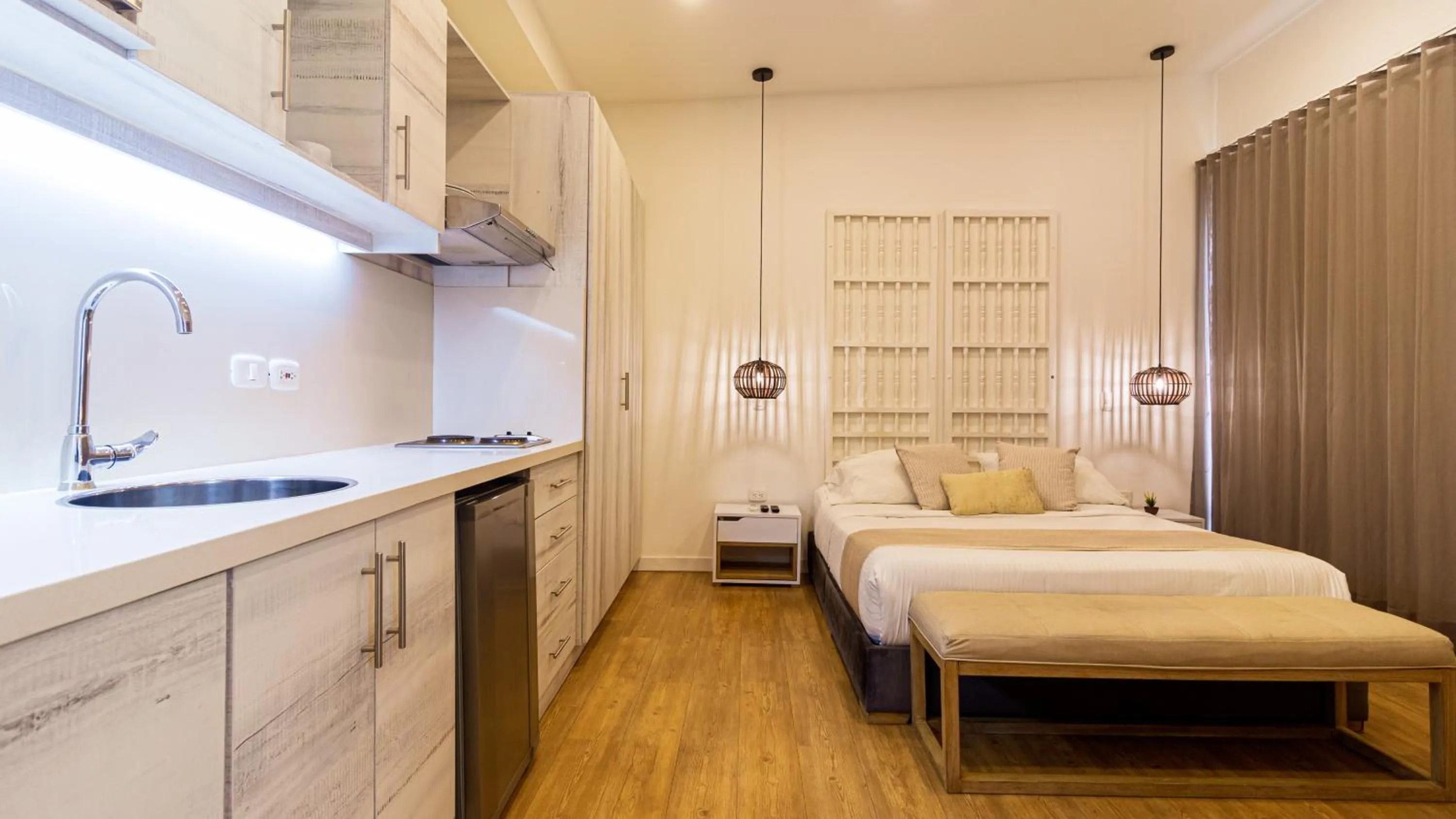 Kitchen or kitchenette, Bed in Cartagena Suites de Manga