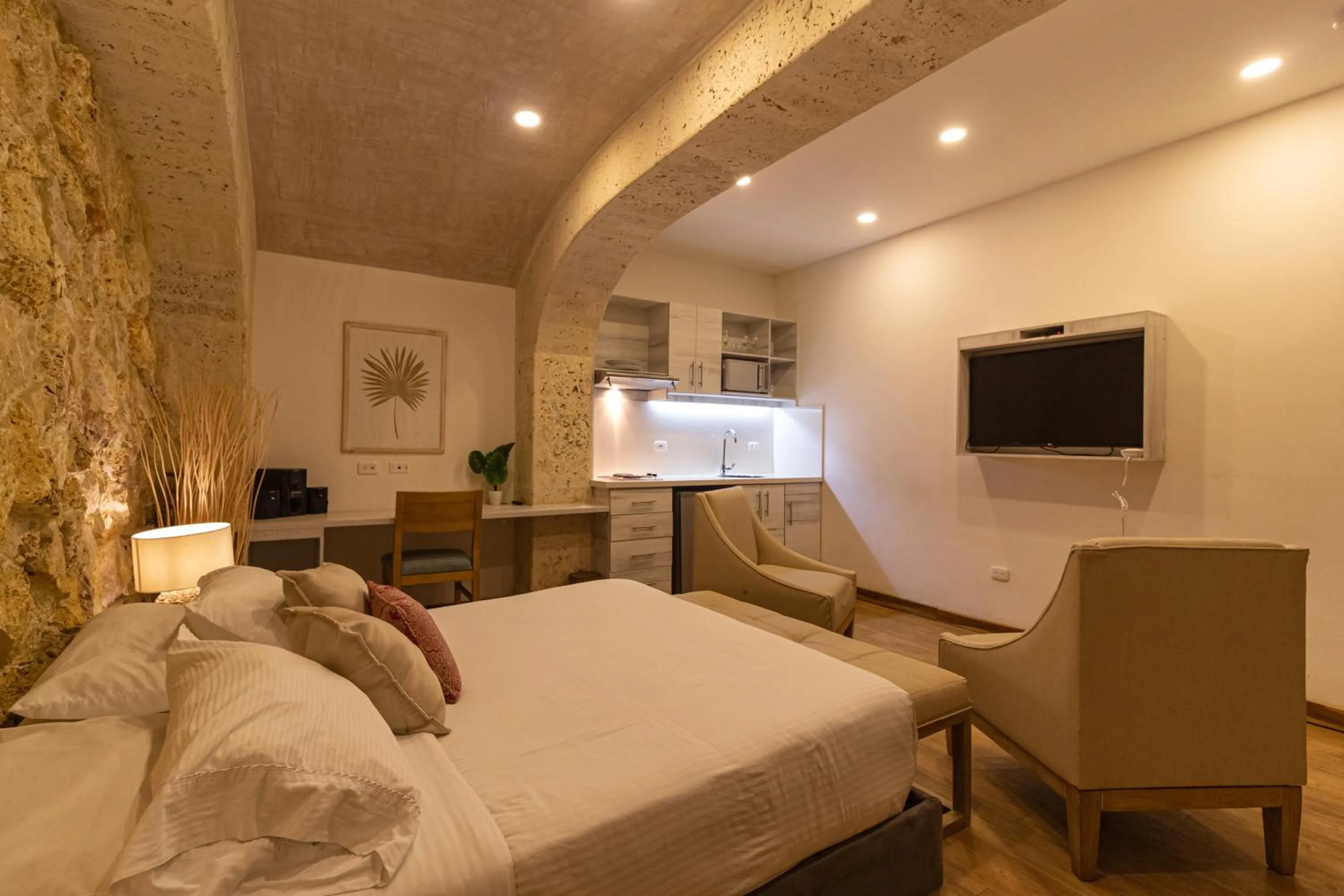 Photo of the whole room, Bed in Cartagena Suites de Manga