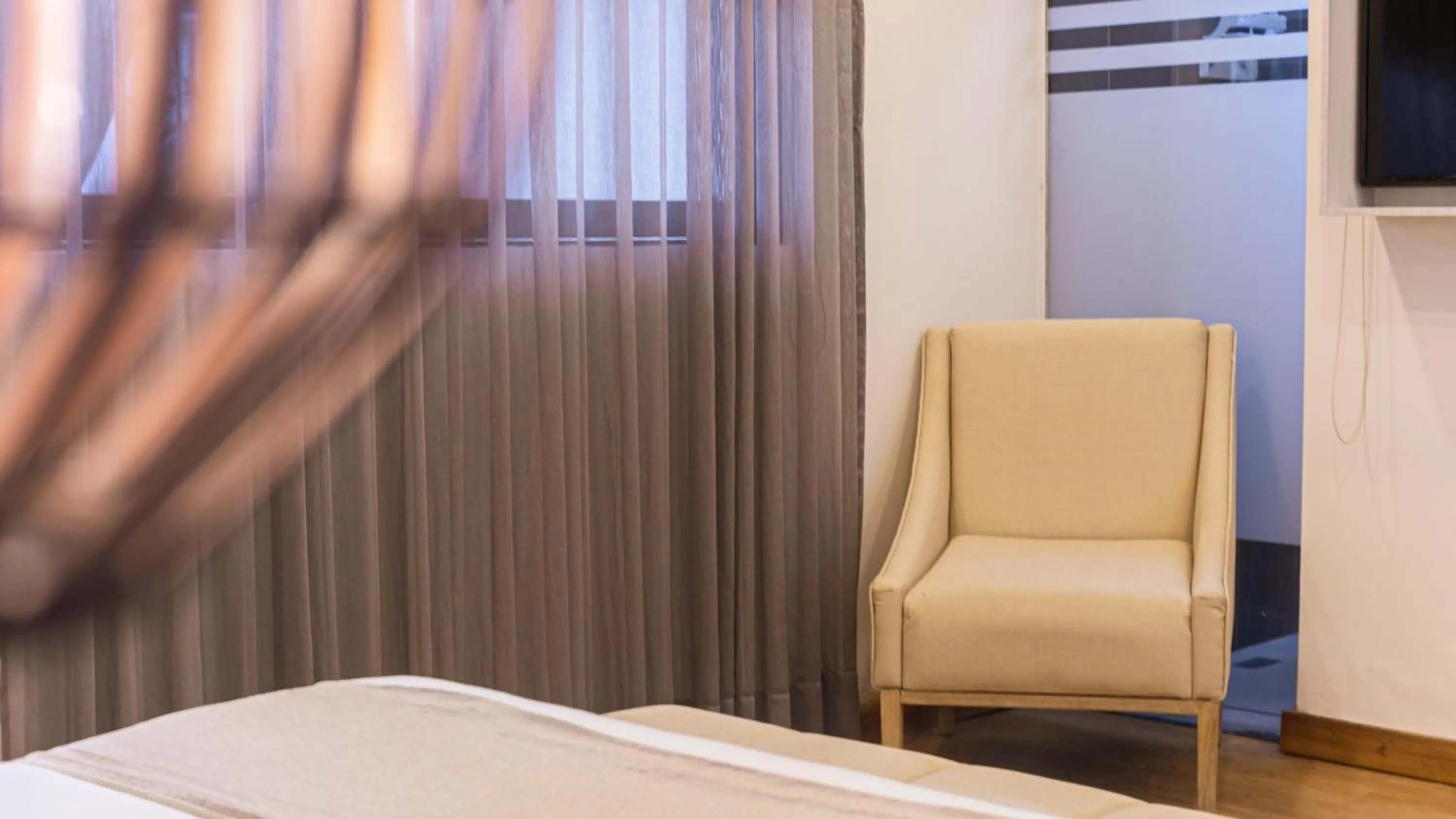 Living room, Bed in Cartagena Suites de Manga