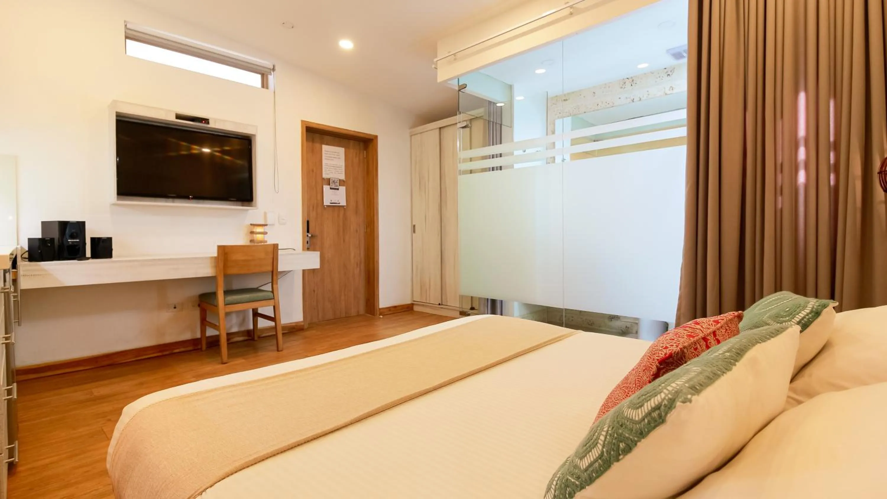 Photo of the whole room, Bed in Cartagena Suites de Manga