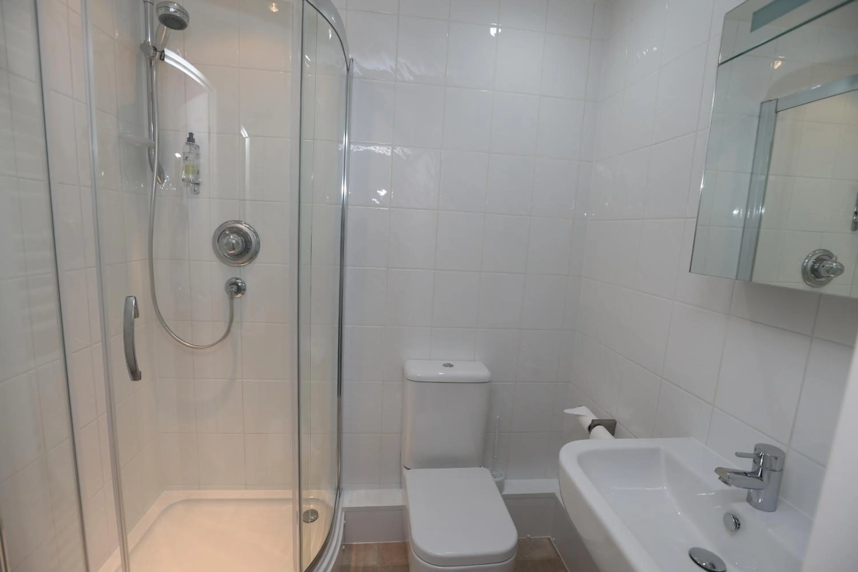 Bathroom in Corner House Hotel Gatwick with bookable Holiday parking