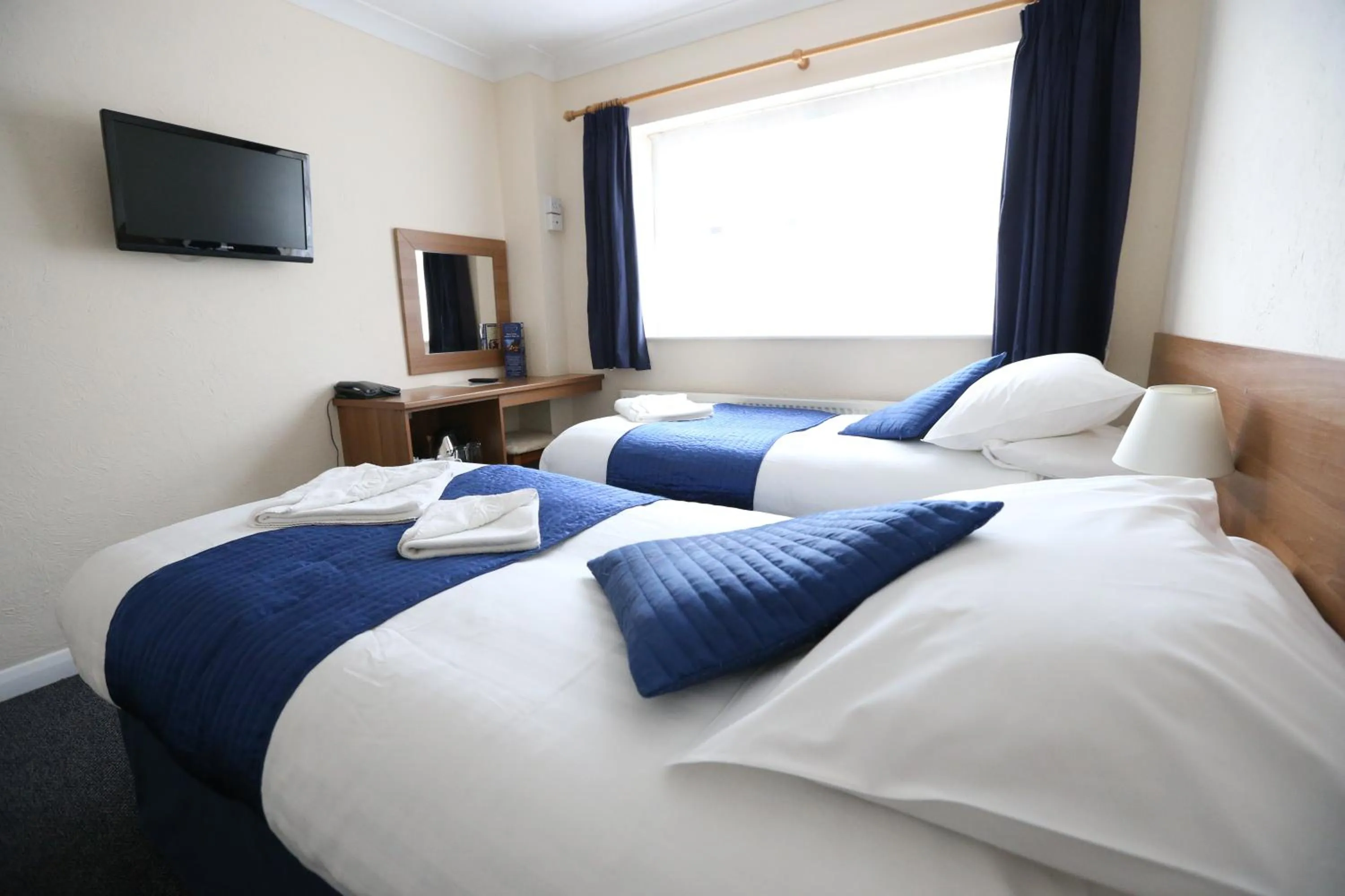 Bedroom, Bed in Corner House Hotel Gatwick with bookable Holiday parking