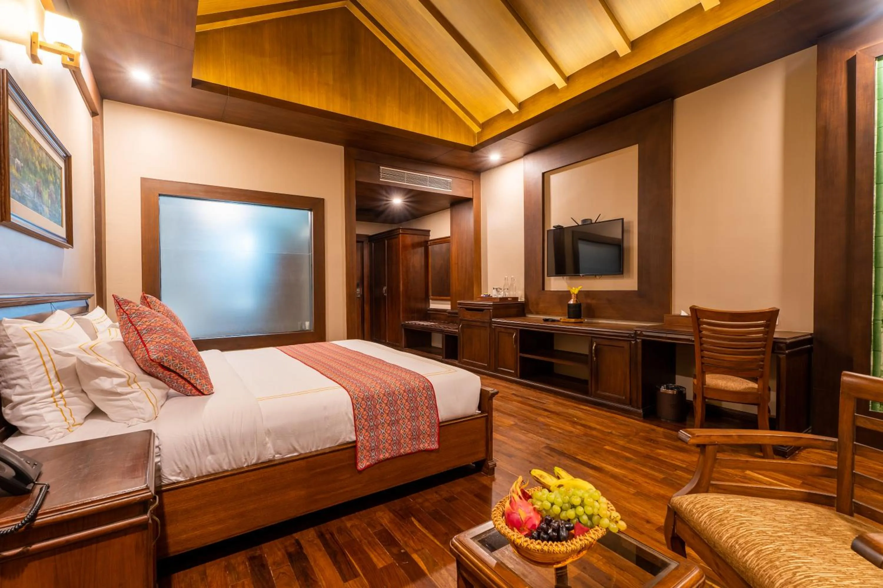 Bed in River Bank Jungle Resort, Chitwan