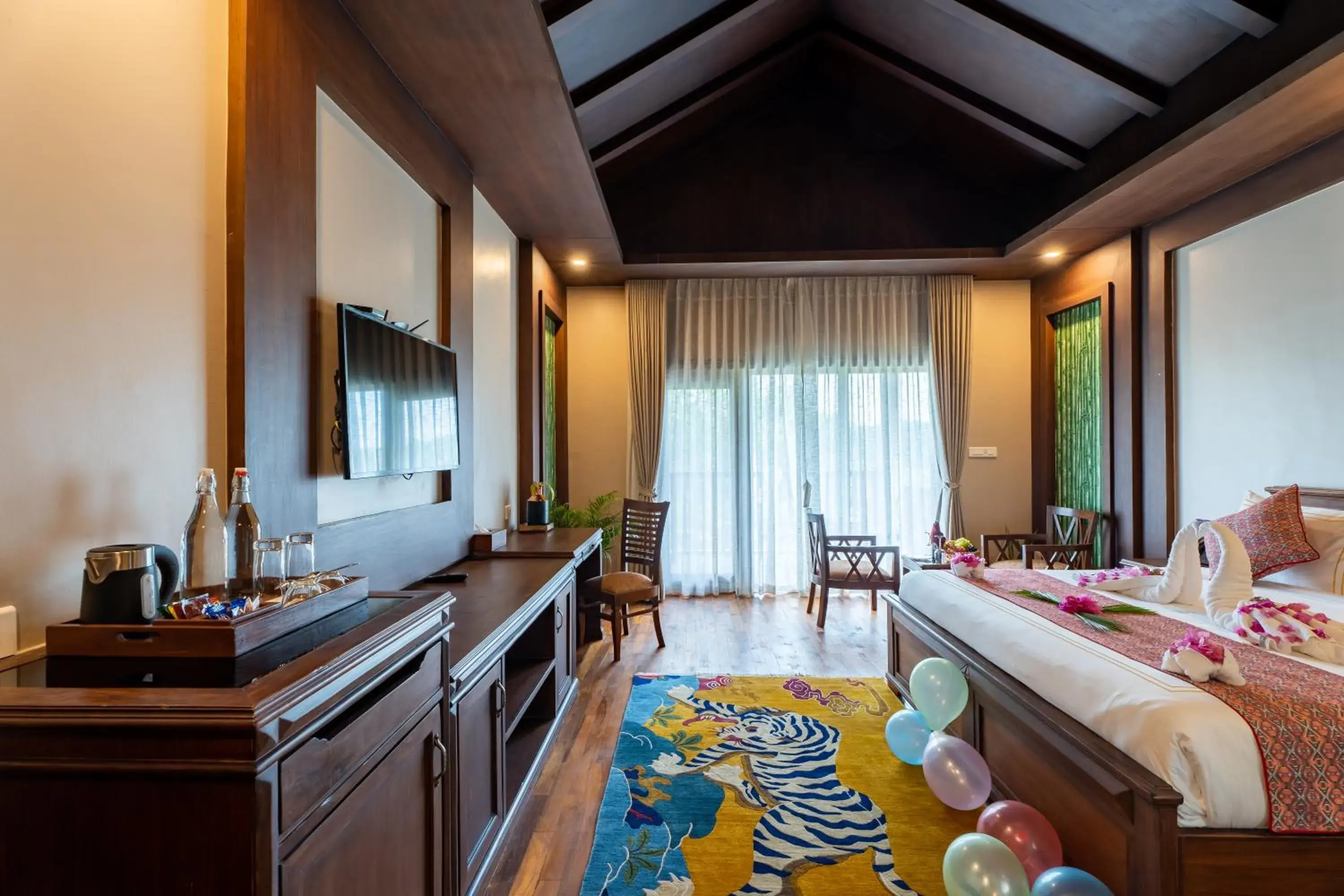 TV and multimedia, Bed in River Bank Jungle Resort, Chitwan TV and multimedia, Bed in River Bank Jungle Resort, Chitwan