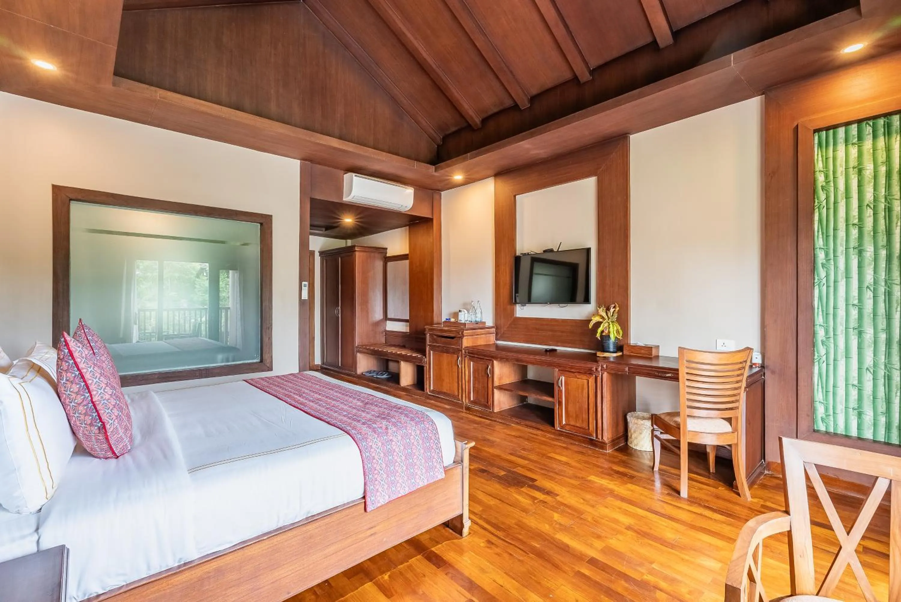 Bed in River Bank Jungle Resort, Chitwan