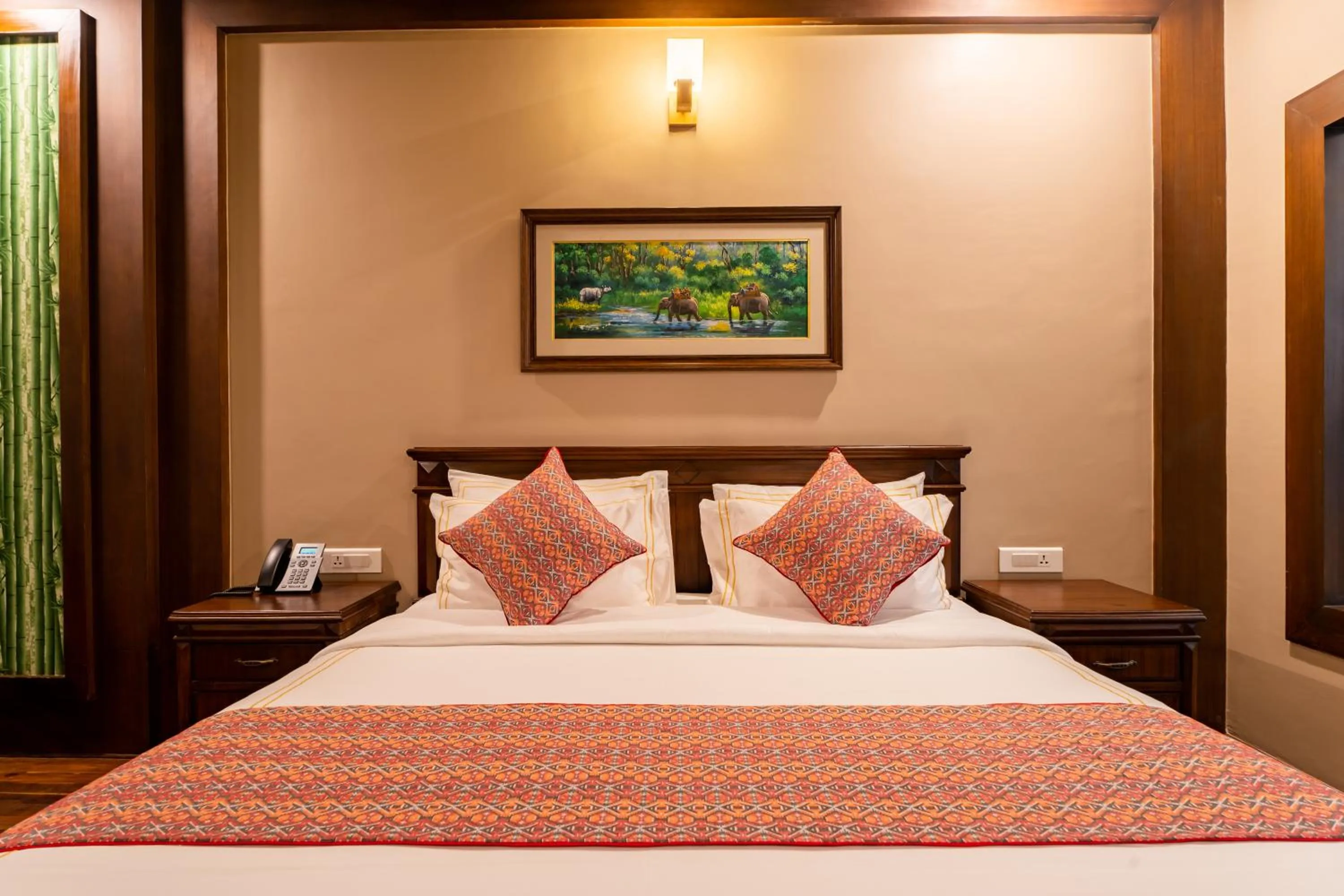 Bed in River Bank Jungle Resort, Chitwan