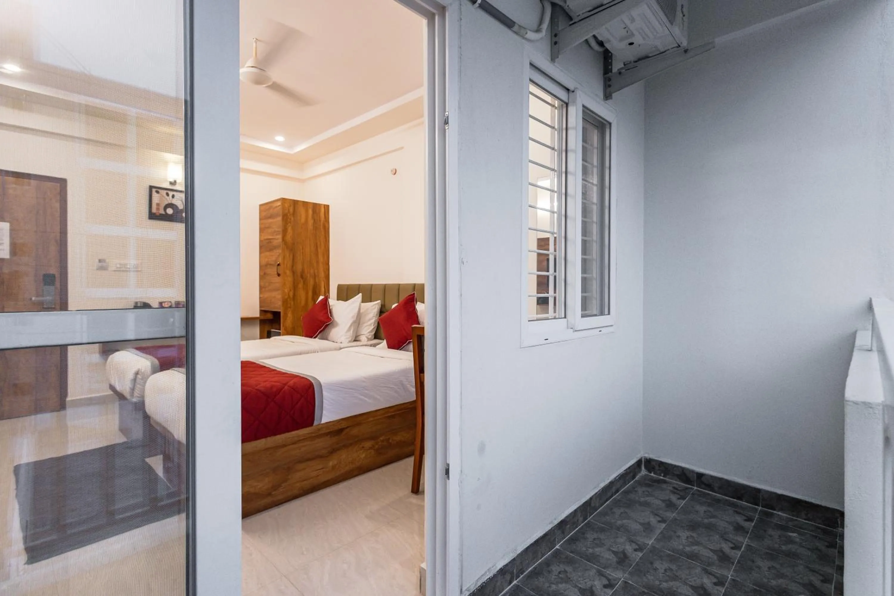 Balcony/Terrace, Bed in The Auberge Boutique Hotel - Manyata Tech Park