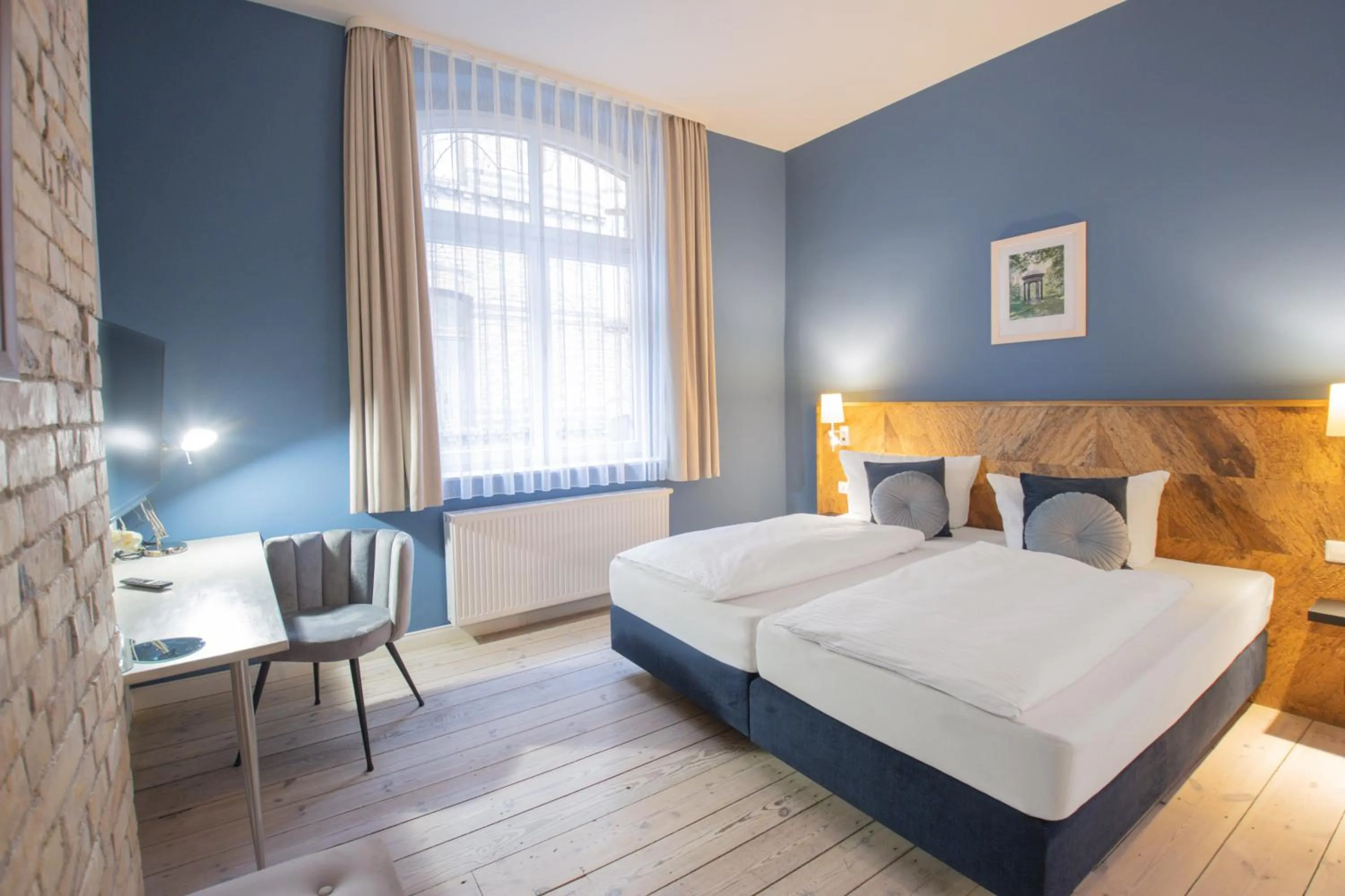 Photo of the whole room, Bed in Boutique Hotel Schwarzer Baer