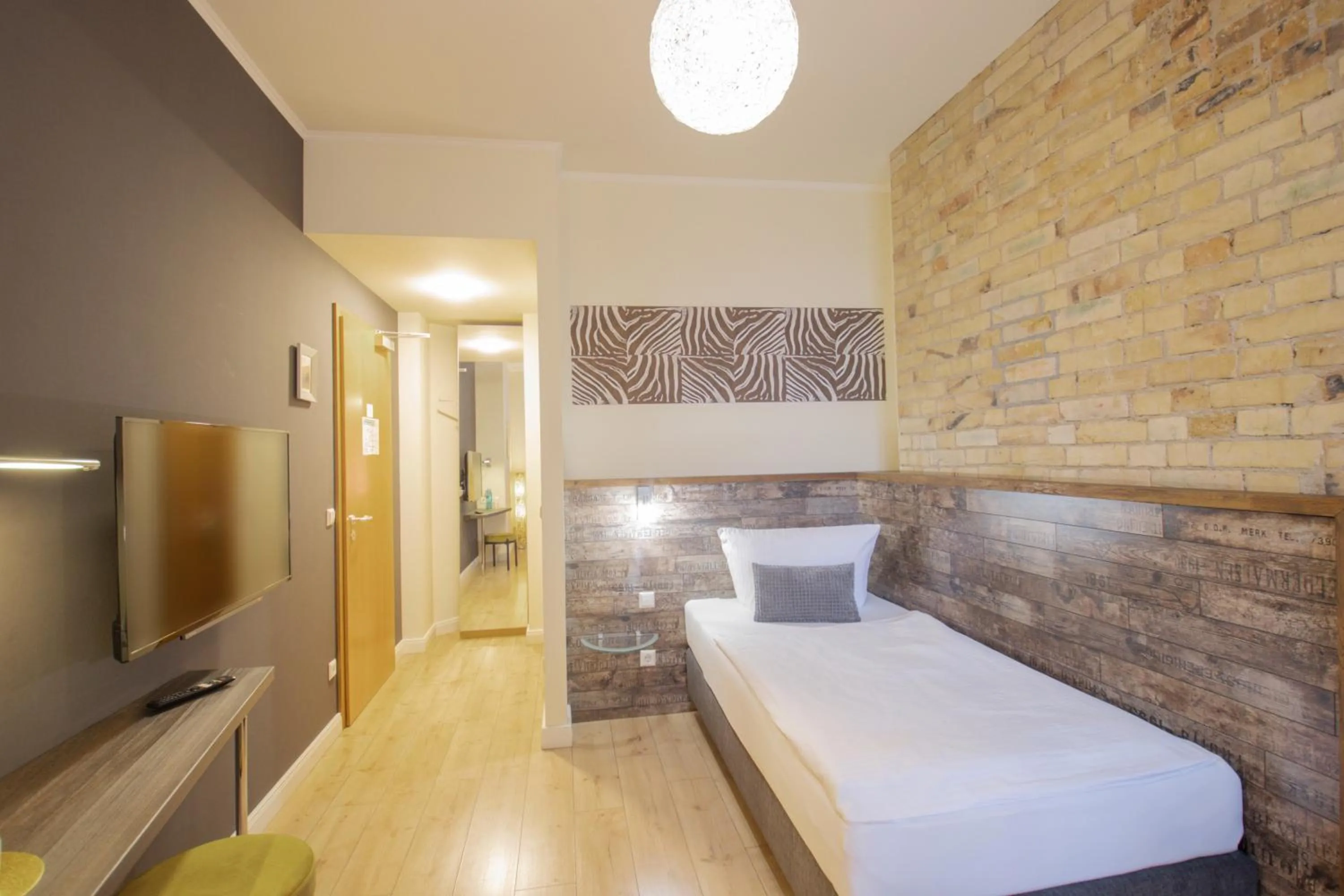 Photo of the whole room, Bed in Boutique Hotel Schwarzer Baer