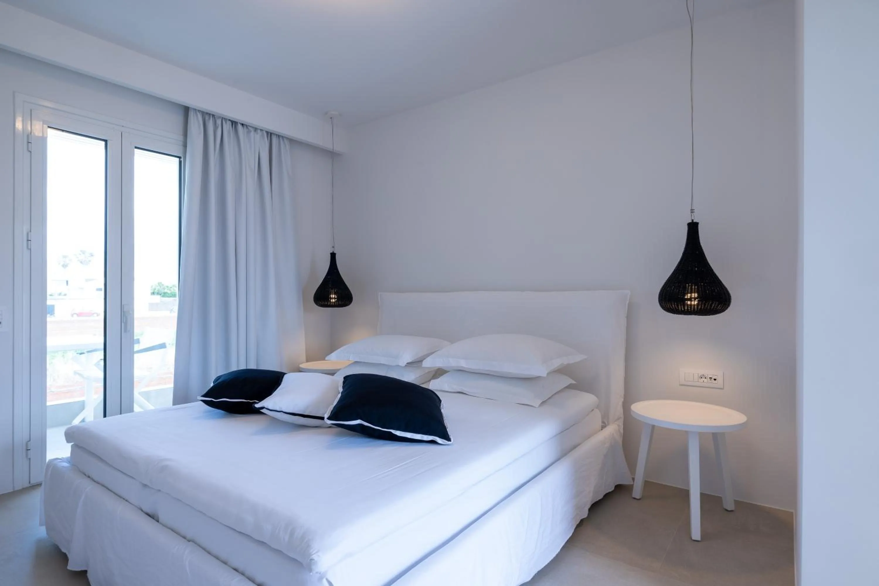 Bed in Akrogiali Garden Hotel
