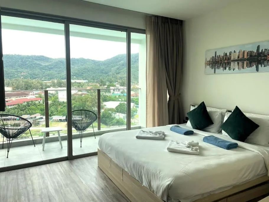 Bed in Sea view apartment at Oceana by Lofty