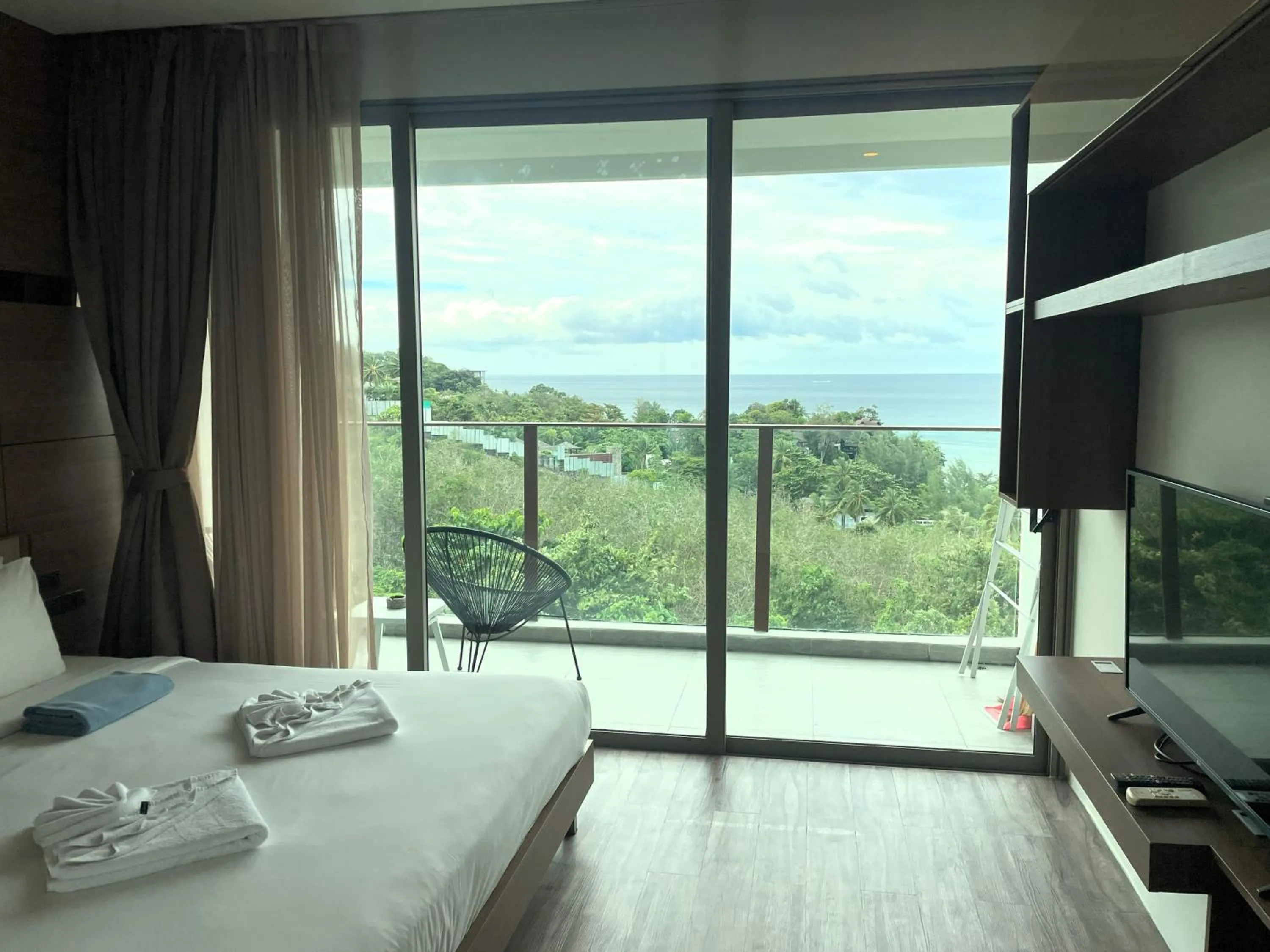 Bed in Sea view apartment at Oceana by Lofty