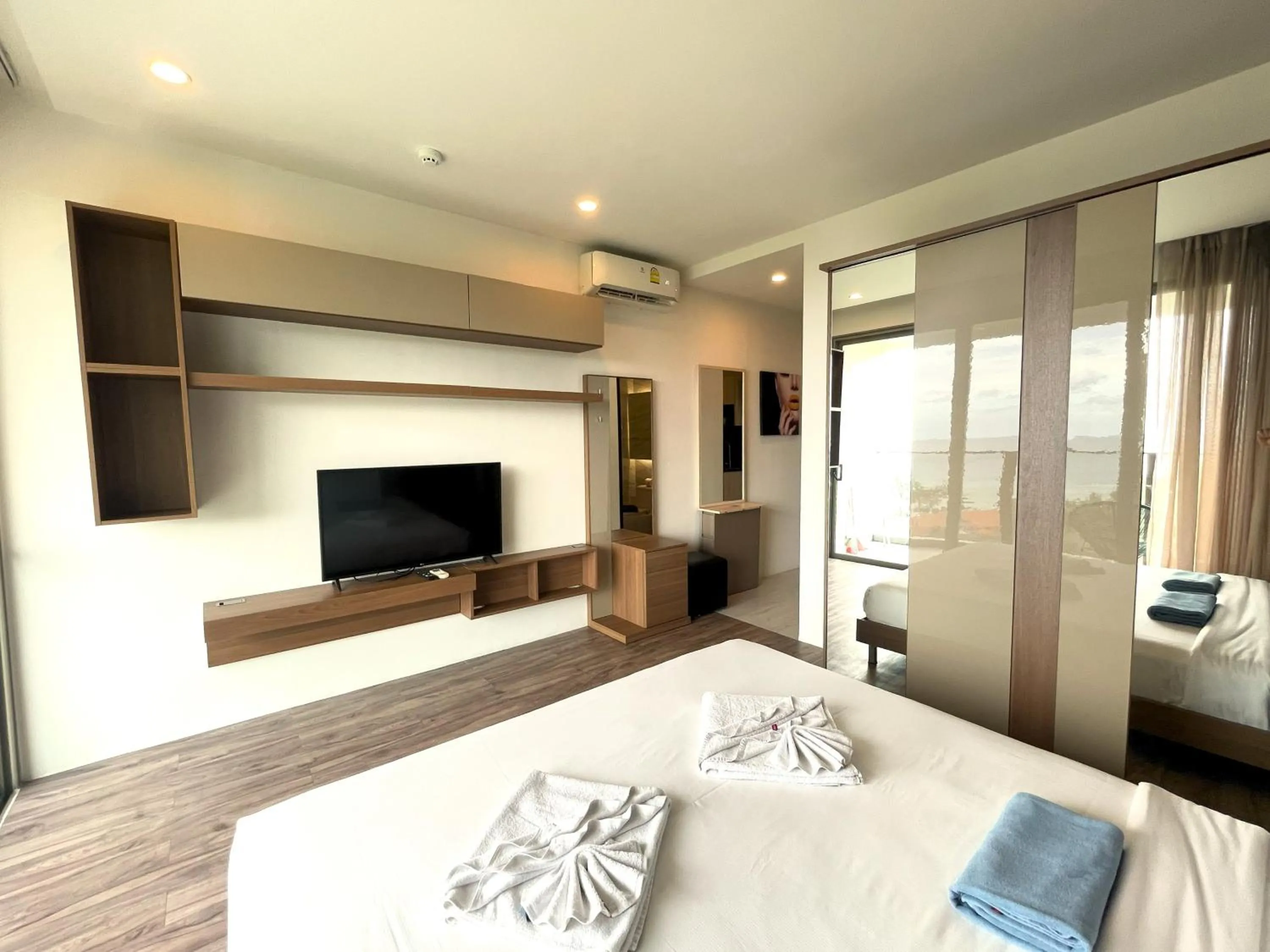 Bed in Sea view apartment at Oceana by Lofty