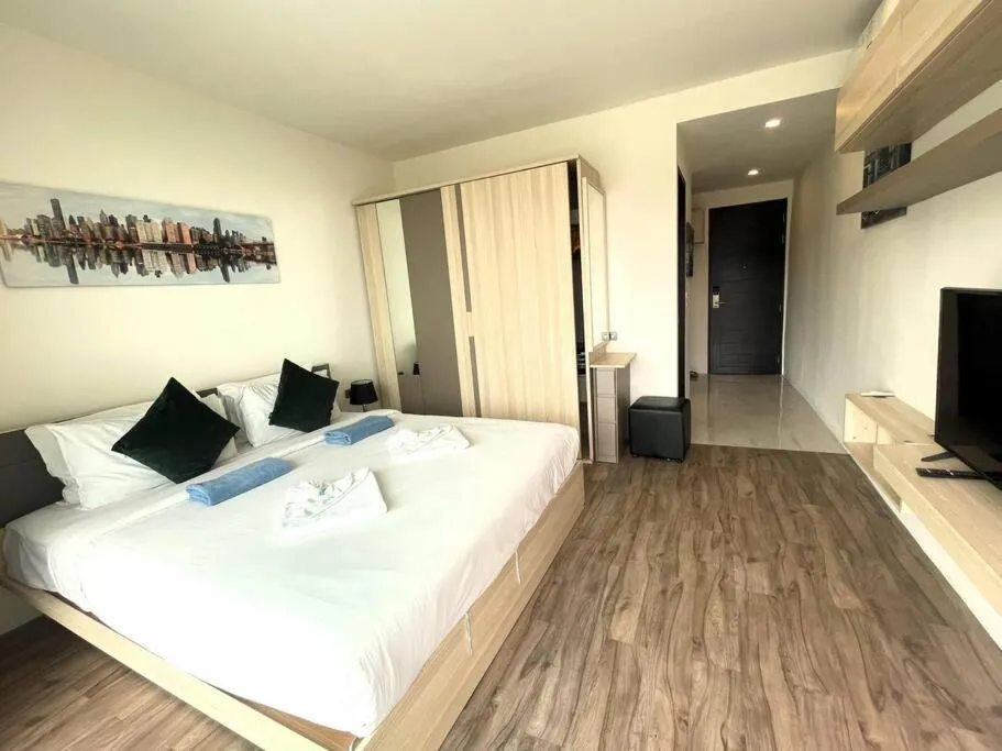 Bed in Sea view apartment at Oceana by Lofty