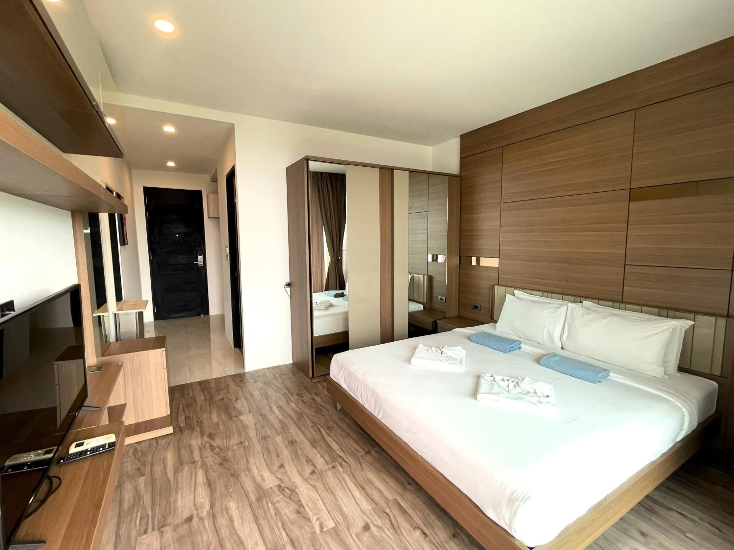 Bed in Sea view apartment at Oceana by Lofty