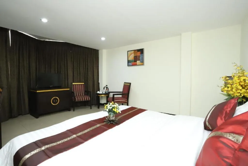 Bed in Lucky Palace Hotel